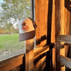 Brown and white “Mack” trucker hat